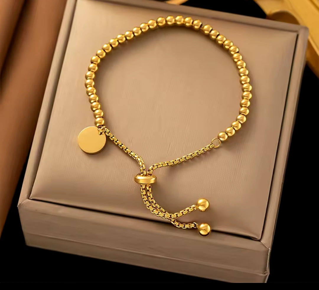 Pulsera ajustable de acero inoxidable con balines/ Adjustable stainless steel bracelet with pellets