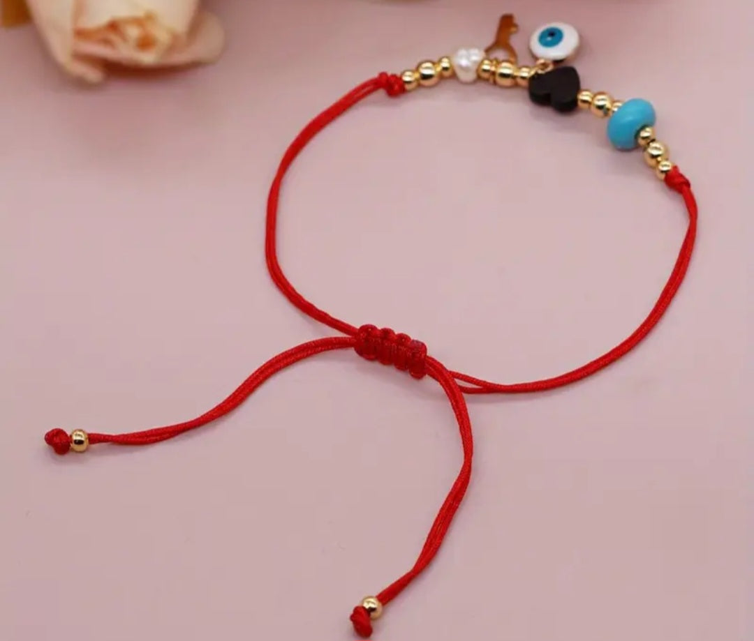 Pulsera de protección hilo rojo azabache/ Jet red thread protection bracelet