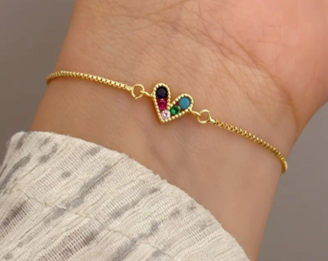 Pulsera ajustable con dije de corazon con Zircon/ Adjustable bracelet with heart charm and Zircon