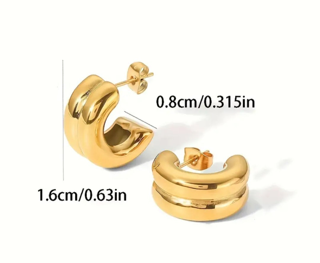 Pendientes tipo aros de acero inoxidable en 2 tonos dorado y plateado/ Stainless steel hoop earrings in two tones: gold and silver