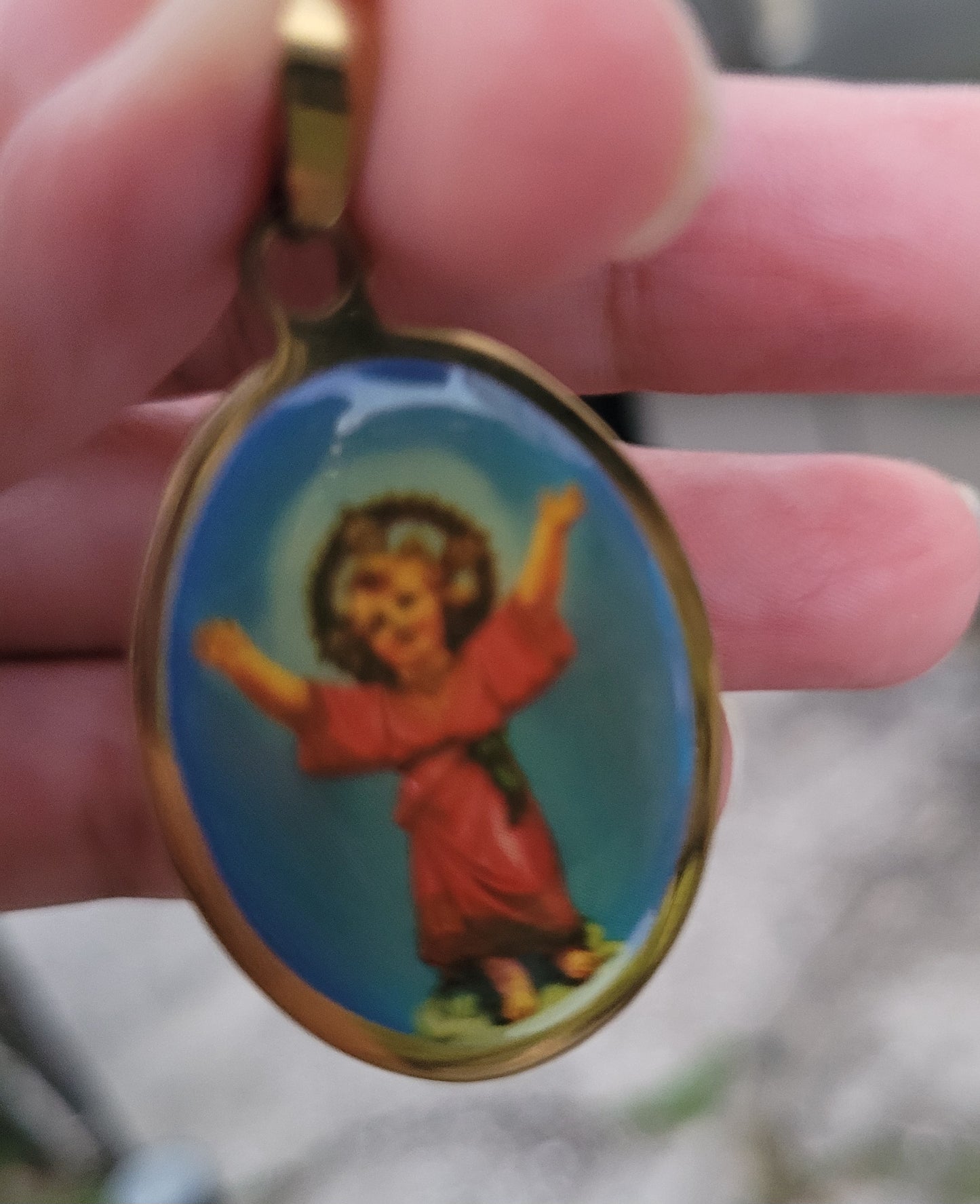 Dije de acero inoxidable del Divino Niño/ Stainless steel pendant of the Divine Child