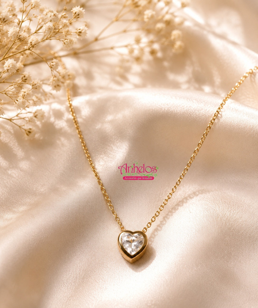 Cadena de acero inoxidable con dije de corazon con Zircon/ Stainless steel chain with heart pendant and zircon.